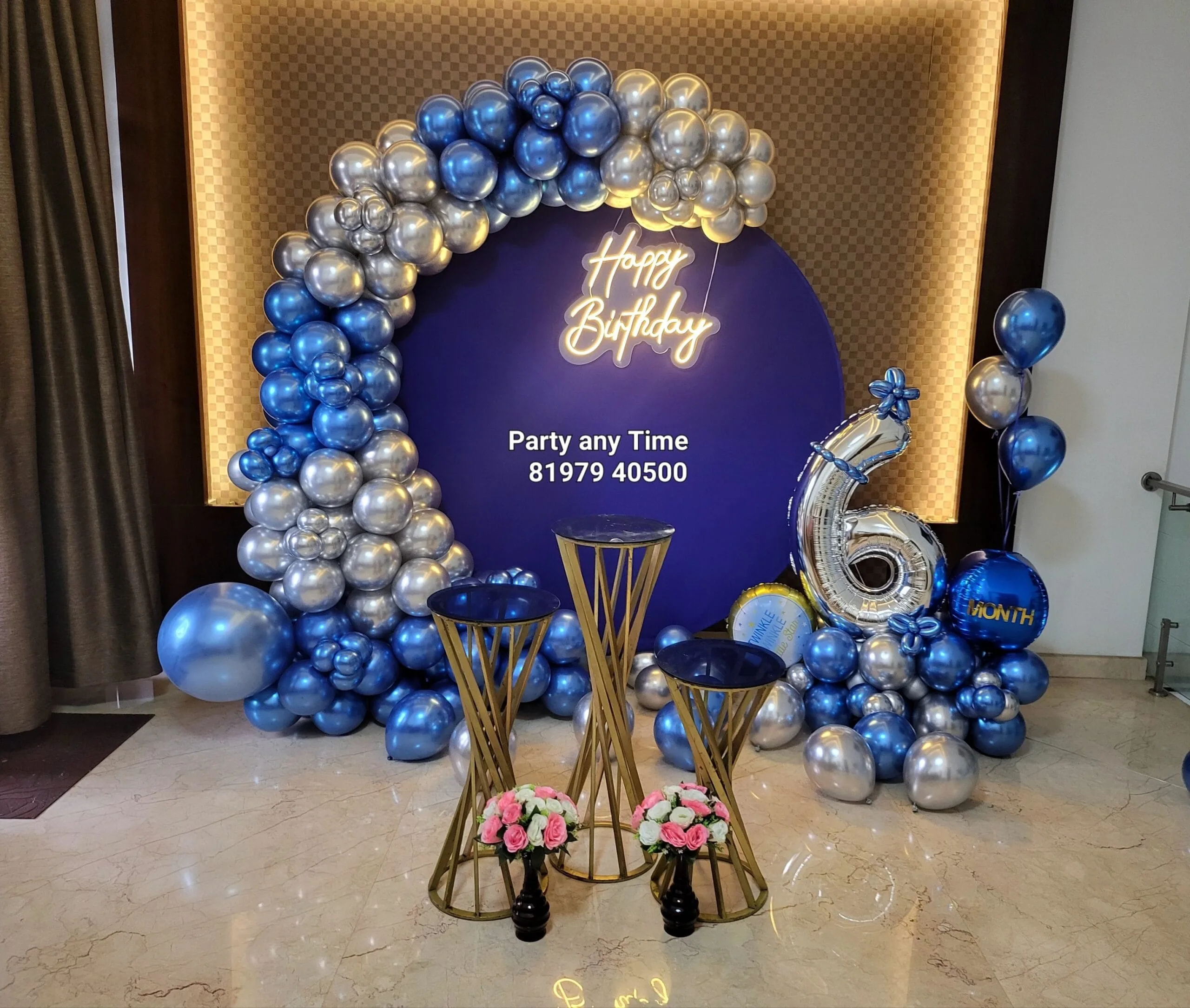 blue and silver chrome balloons
