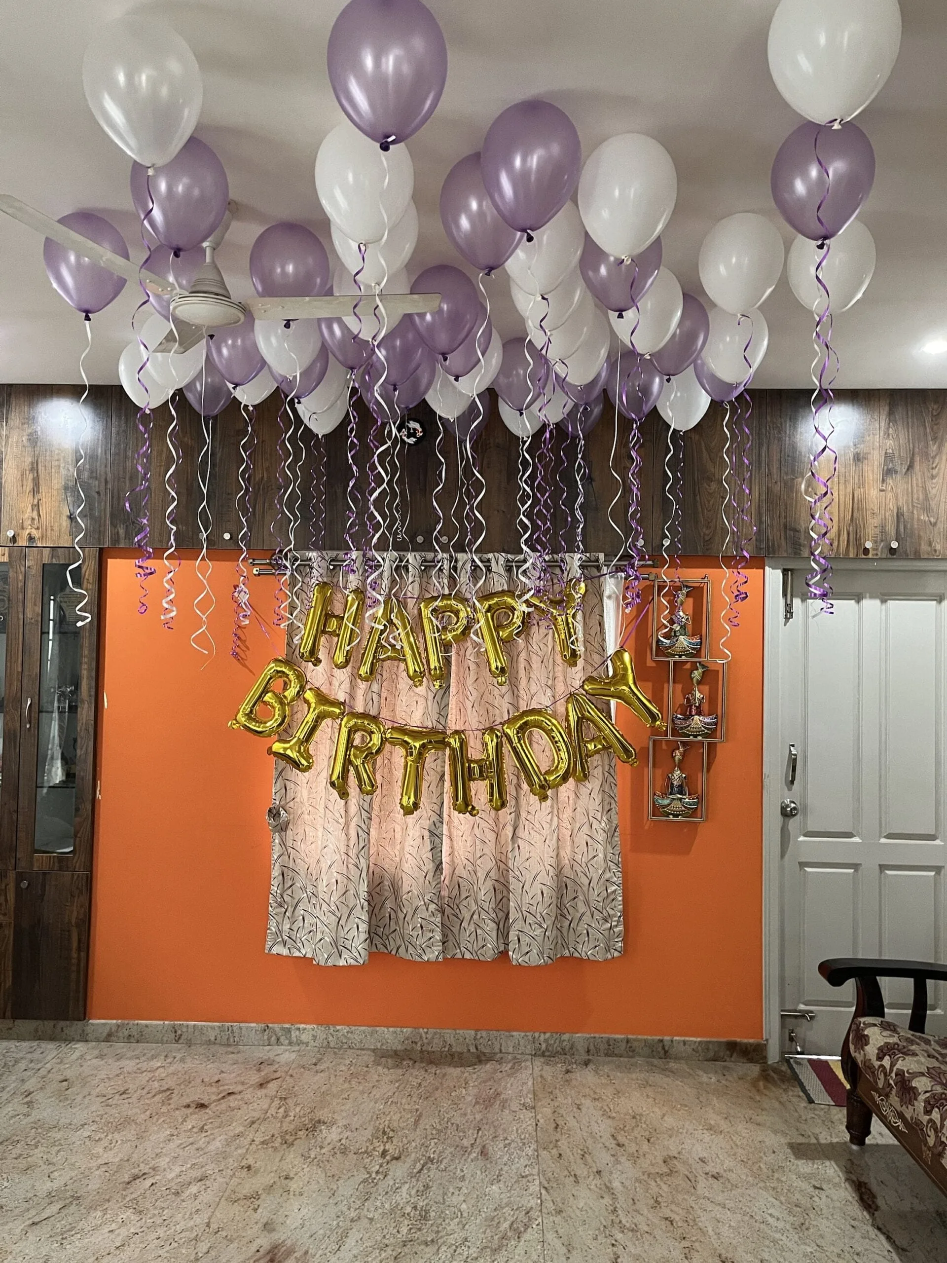 40 helium balloons and happy birthday foil